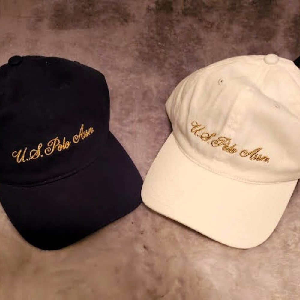 NWT US POLO ASSOCIATION ADJUSTABLE BALL CAPS 1 WHITE 1 BLACK WITH GOLD LETTERING